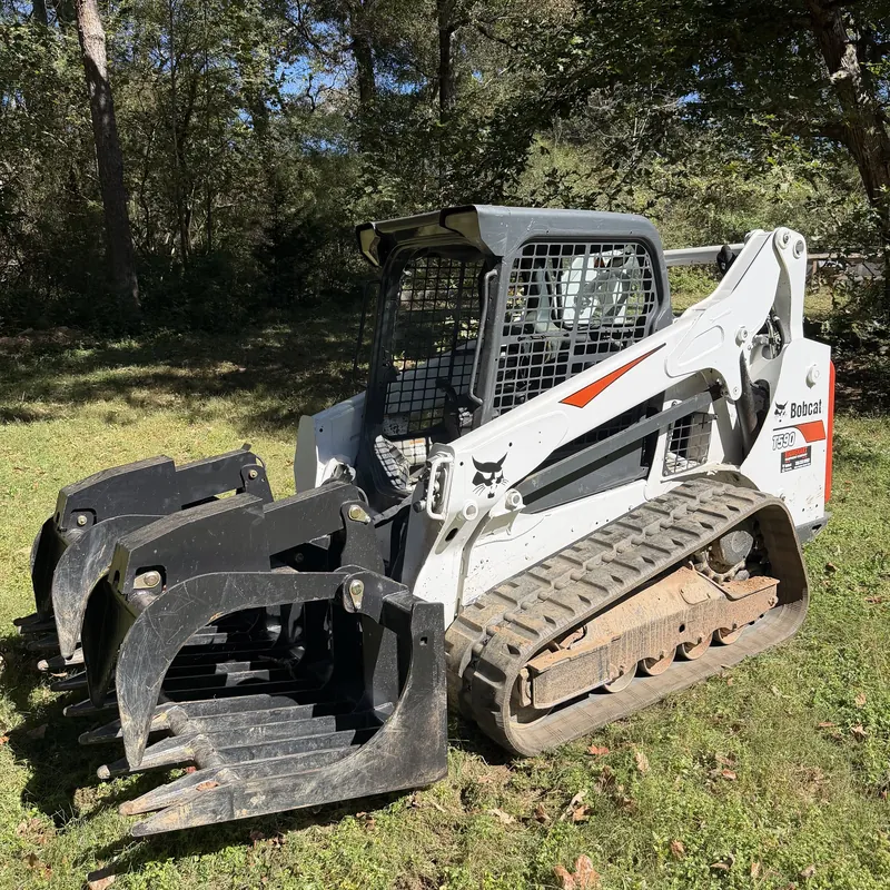 Bobcat T590 compact track loader with the grapple